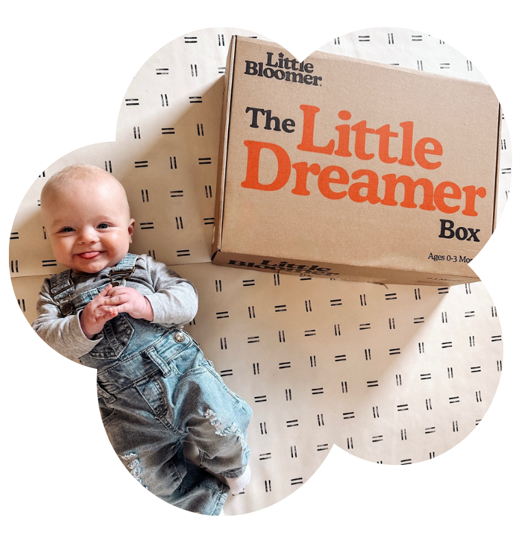 Baby with Little Dreamer Newborn Toy Subscription Box by Little Bloomer